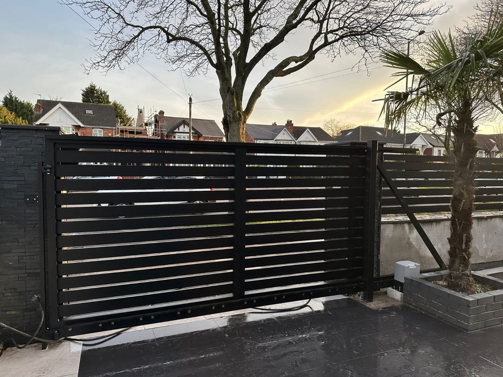 Modern home with AlumaGates aluminium fencing and gates
